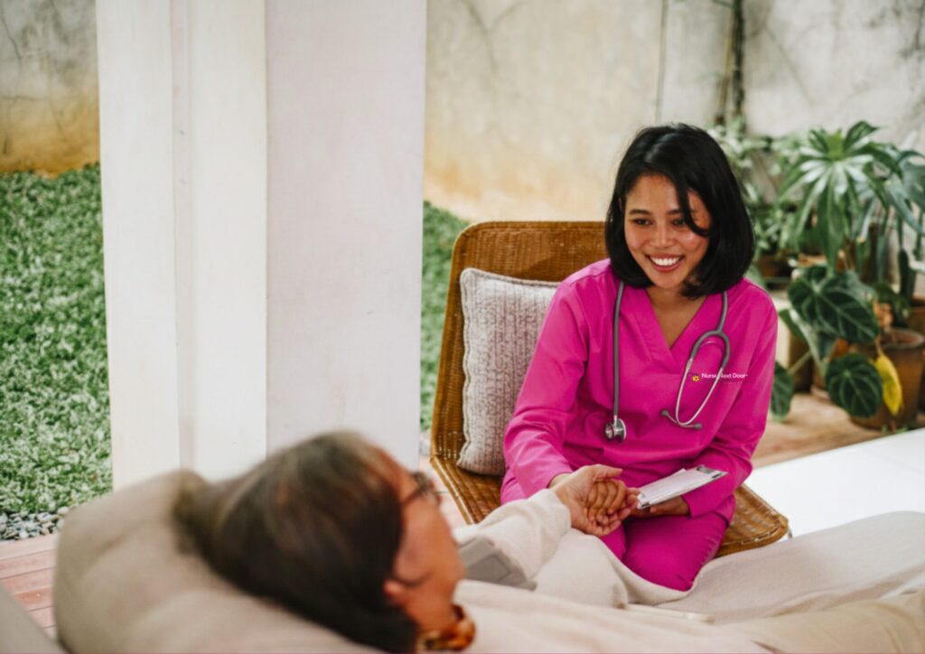 Support at Home End-of-Life Pathway 2 Elderly woman in bed being cared for by Nurse Next Door Nurse 1