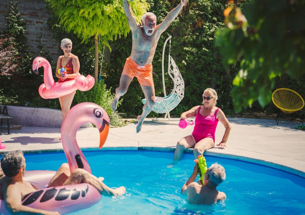 Seniors Having fun by the pool