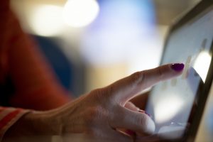 elderly person using an ipad