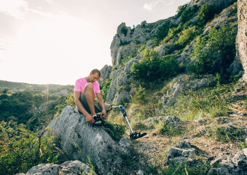 Man with a disability getting ready for a hike