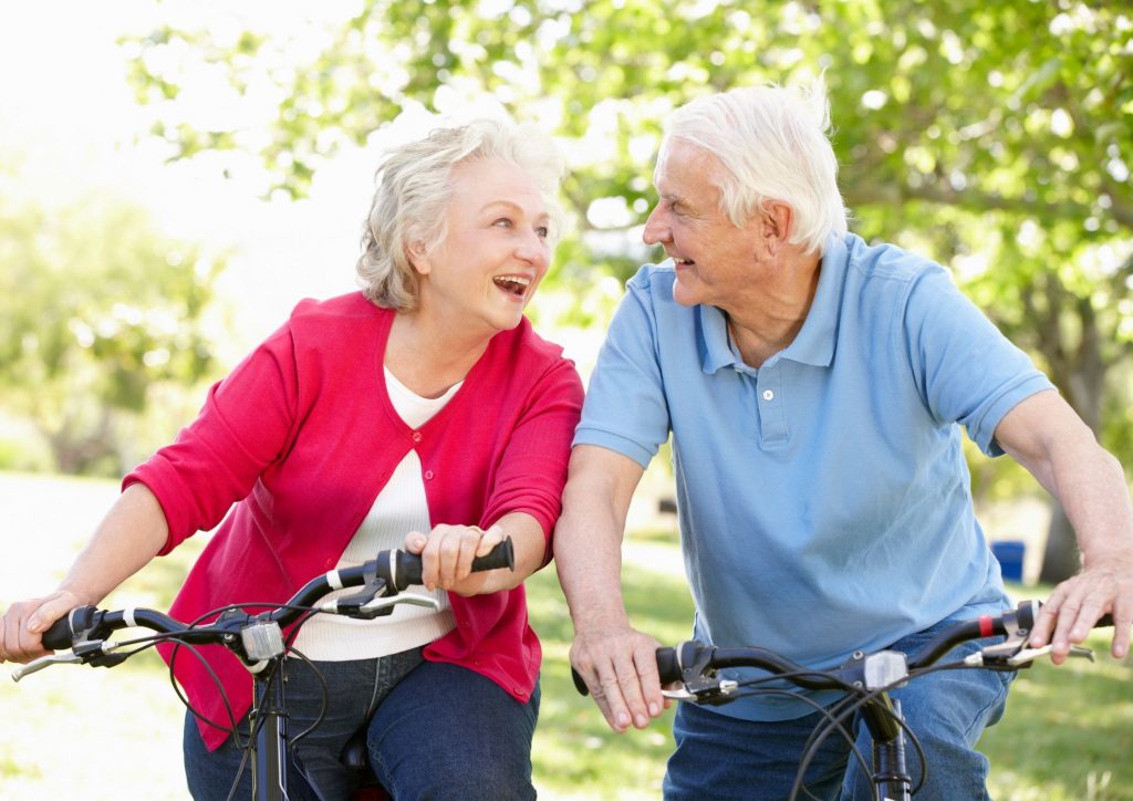 Senior Couple Riding a Bike