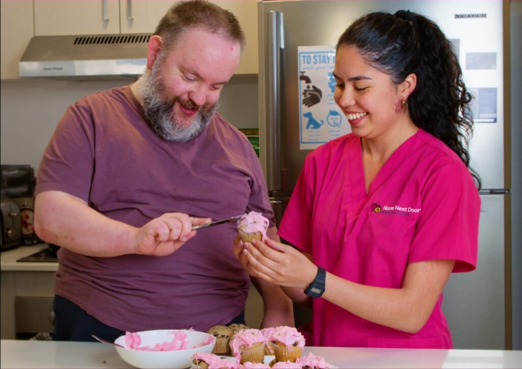 Nurse Next Door client making cupcakes with caregiver